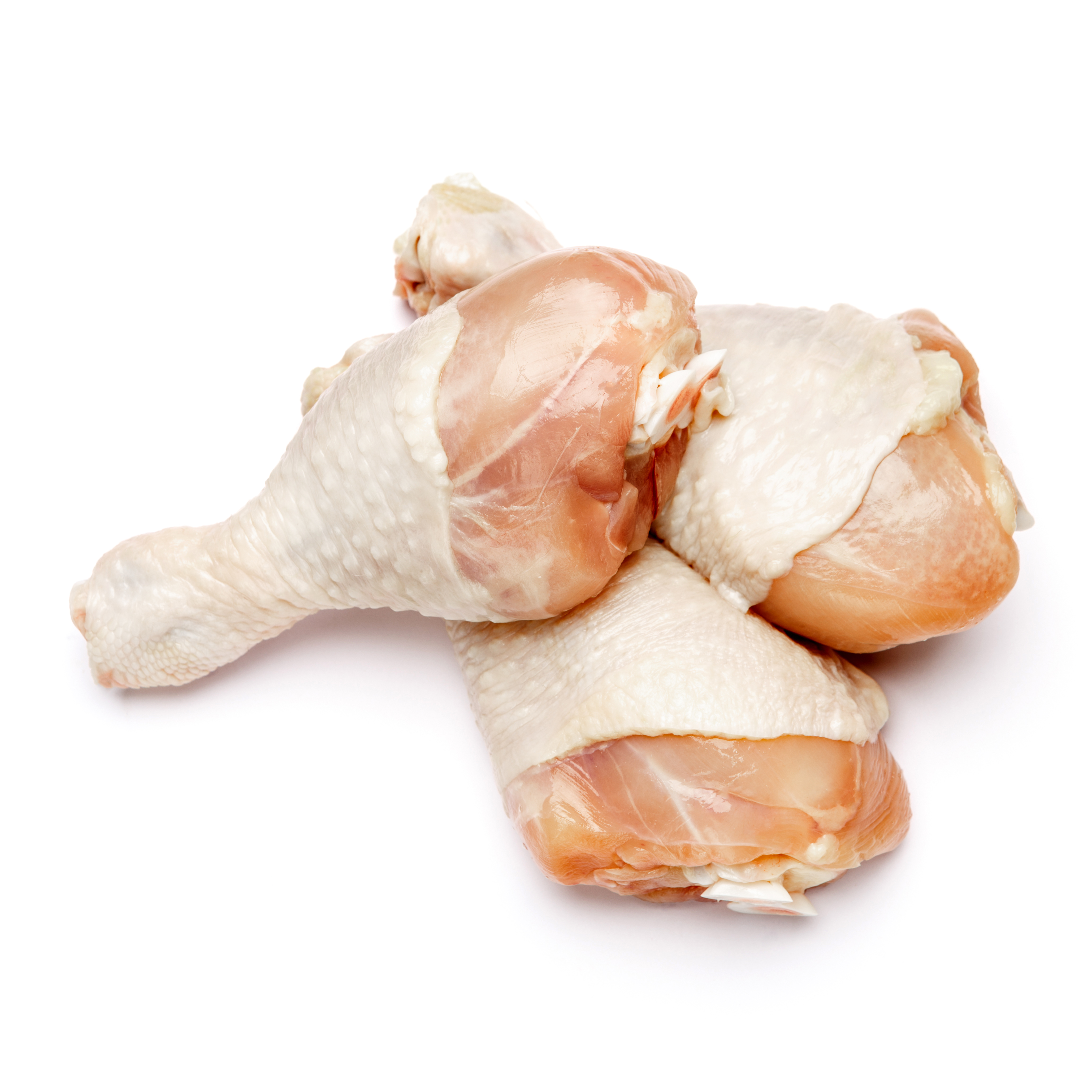 Raw chicken legs on a white background